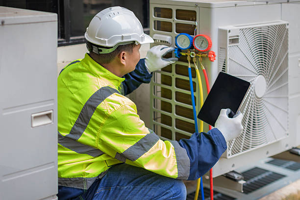 Professional Hvac technician working in Chalmers, IN